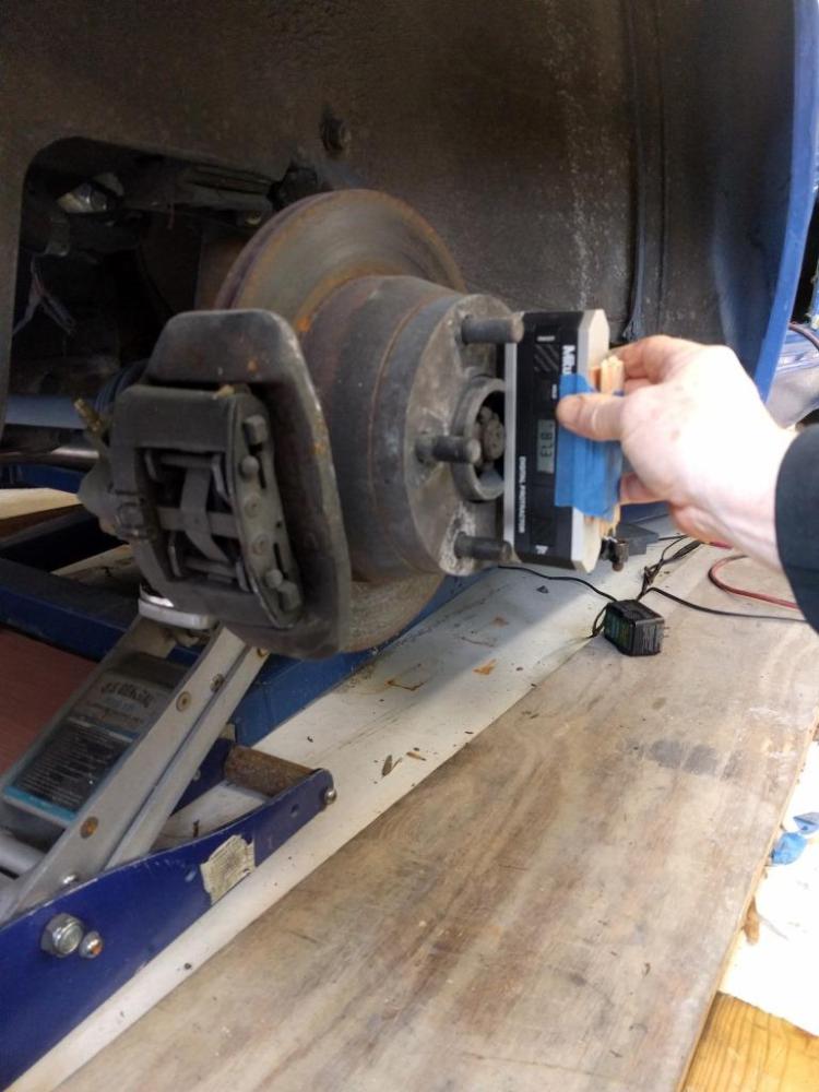 Camber at the hub being measured.