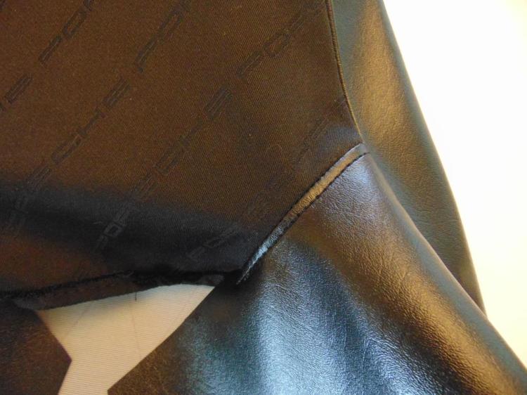 Closeup of the seam between the headrest fabric and the bolster piece. You want to sew this first so that the outer of the end of the seam can be captured within the circumferential seam for the larger piece, thus giving an attractive finished appearance. 